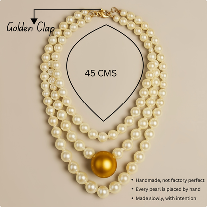 Triple Strand Elegance – White Pearl Choker with Golden Centerpiece