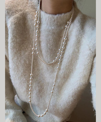 "Pure Grace – Long White Pearl Strand"