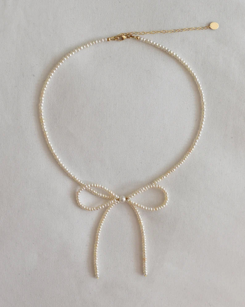 Pearl Bow Necklace – Dainty Feminine Charm