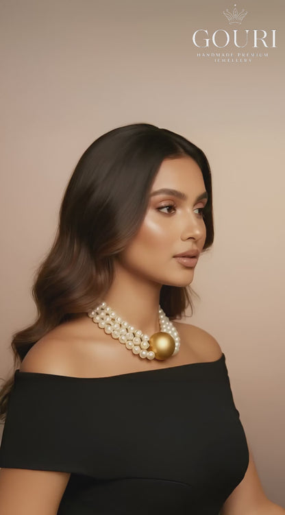 Triple Strand Elegance – White Pearl Choker with Golden Centerpiece