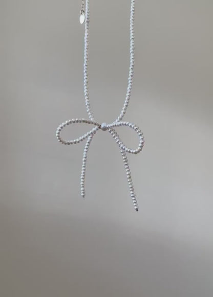 Pearl Bow Necklace – Dainty Feminine Charm